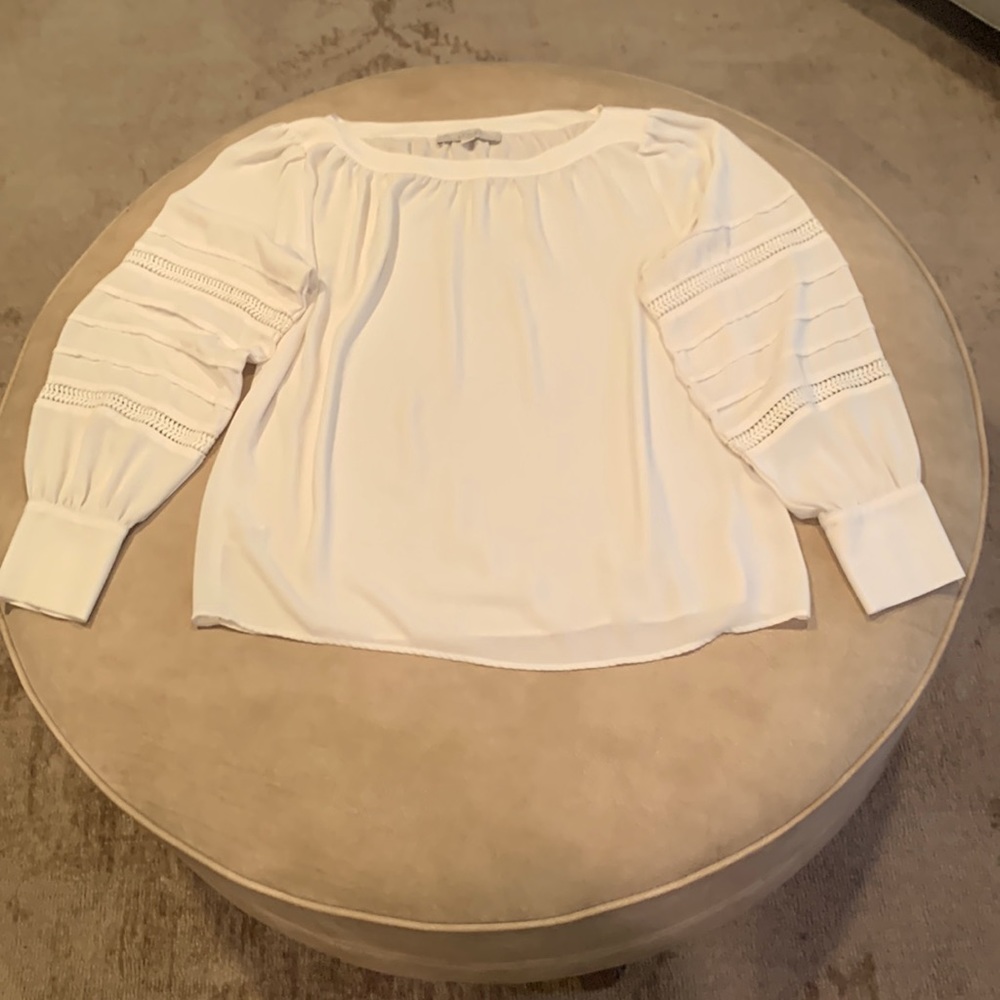 Ann Taylor loft blouse size med has a very small stain